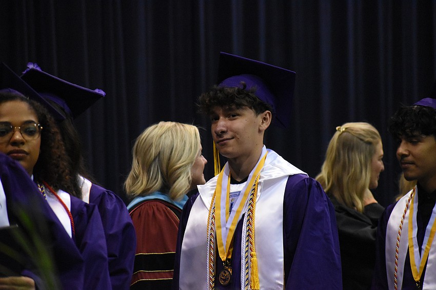 Kai Lopez makes his way across the stage.