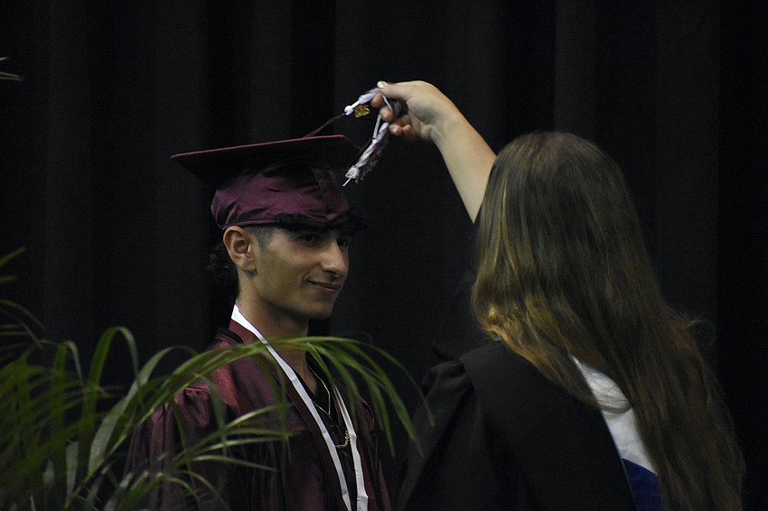 Dominic Figueroa's tassel is moved.