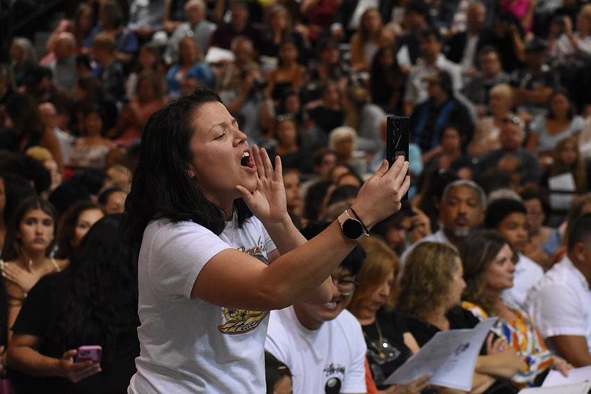 Roselyne Frelinghuysen cheers for her niece Kathleen Minor.
