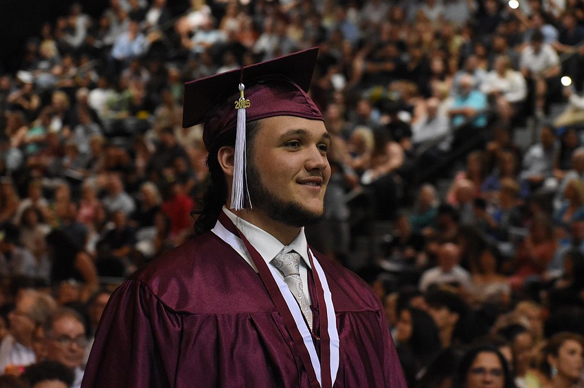 Kody Austin Mosher approaches the stage.