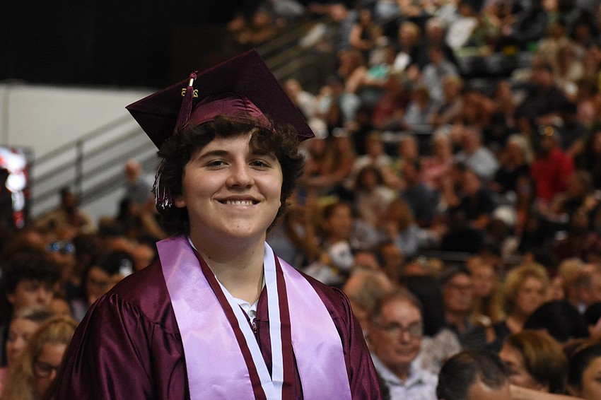 Colby John Nolan approaches the stage.