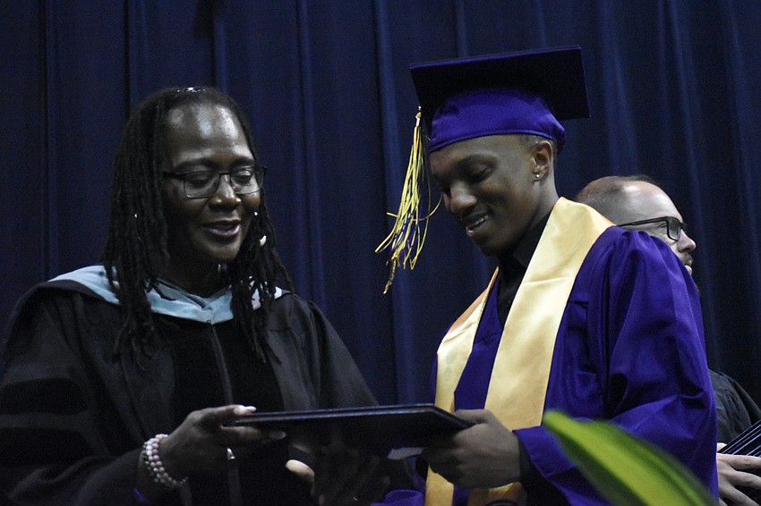 Principal Rachel Shelley greets Jayden White