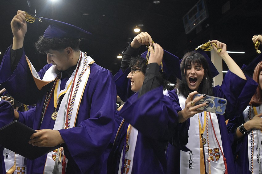 Alexander Edefri, Anthony De La Cruz-Briseno and Fiona Curie reposition their tassles.