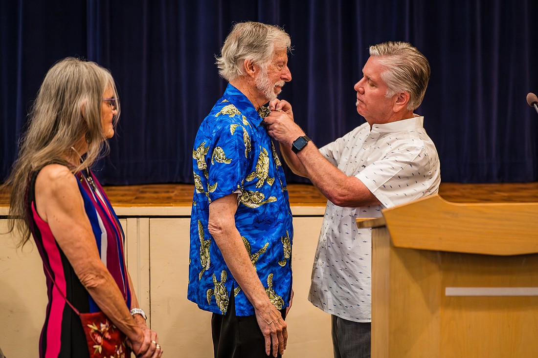 Andrea and Larry Frank are inducted by Preston Root, a member of the Million Dollar Roundtable. Photo courtesy of the Community Foundation and United Way of Volusia-Flagler Counties