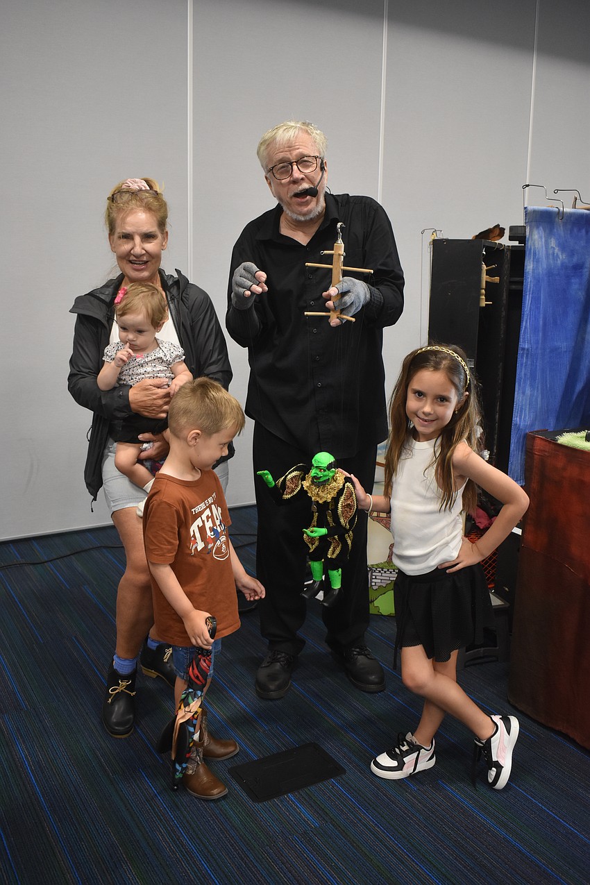 Lakewood Ranch resident Caren Starala brought her grandkids Juliana Born, 6, Troy Born, 4, and Gabriella Born, 10 months, to see the show. Starala says she appreciates how much talent and magic Jerry Bickel presented.