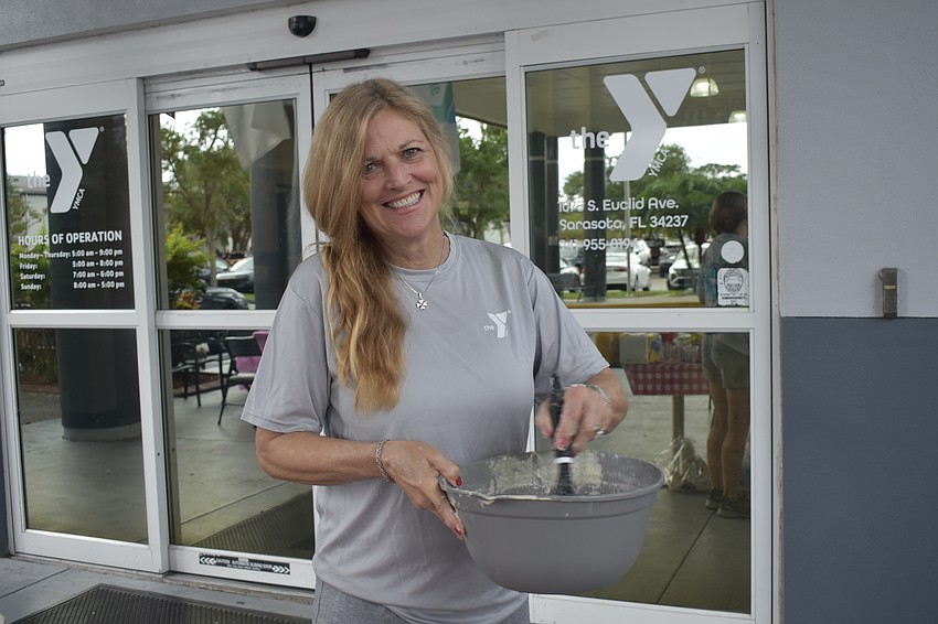 Laura Walters mixes pancakes.