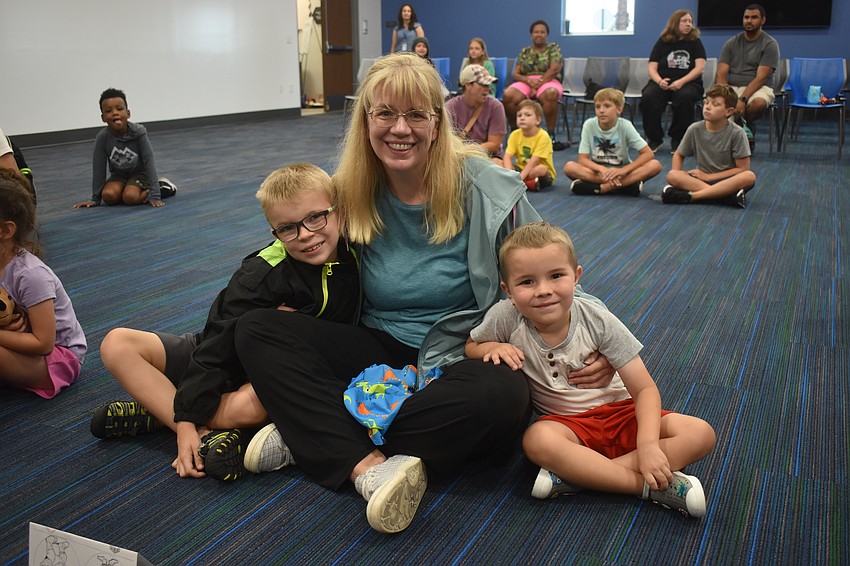 Palmetto's Wanda Jackson brought her grandsons Jackson and Kolton Ambeau of Bradenton to see Puss in Boots.