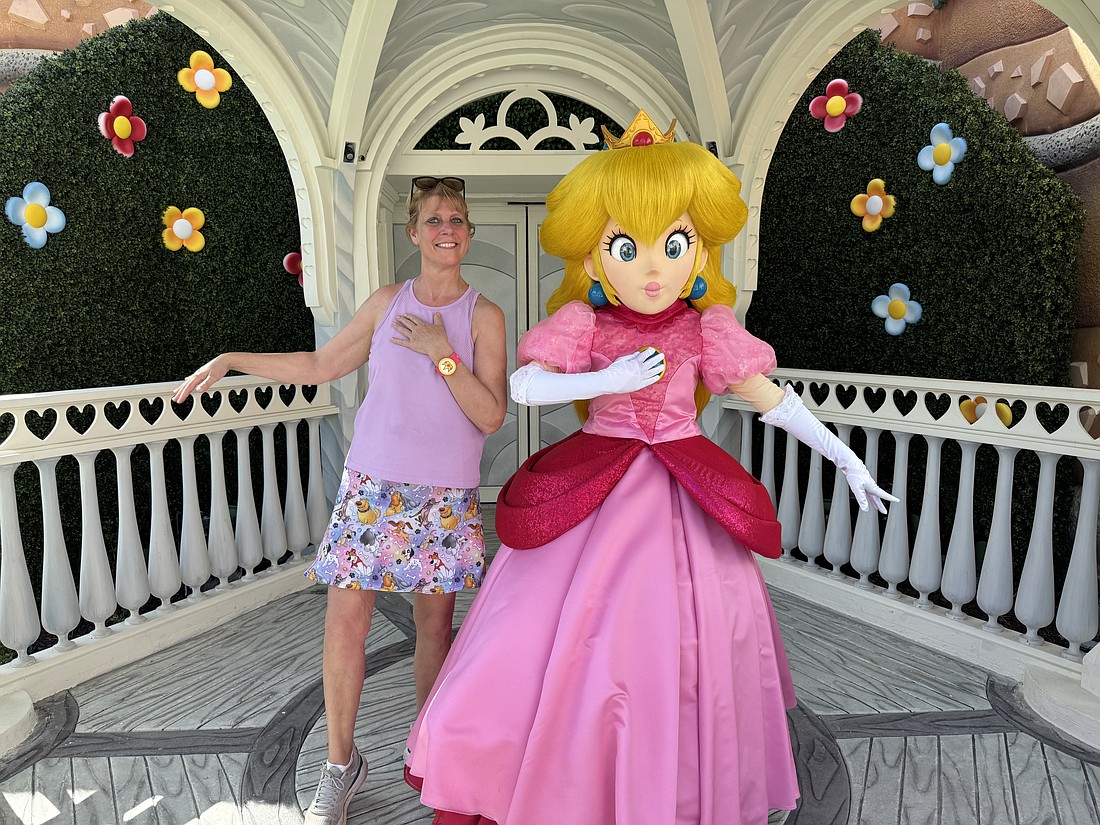 Windermere’s Carol Ziegler met Princess Peach. Ziegler grew up playing Nintendo games and was thrilled to meet Princess Peach in person.
