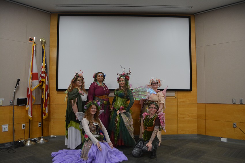 ShimmyBOOM bellydancing group gather together for a group photo all dressed in their fairy attire for SRQCon 2025.