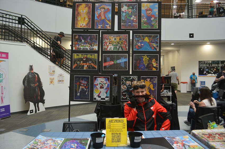 Artist Dalton Reed, cosplaying as Dr.Eggman from the Sonic films, is all set up at his booth, Speedstreak Art.