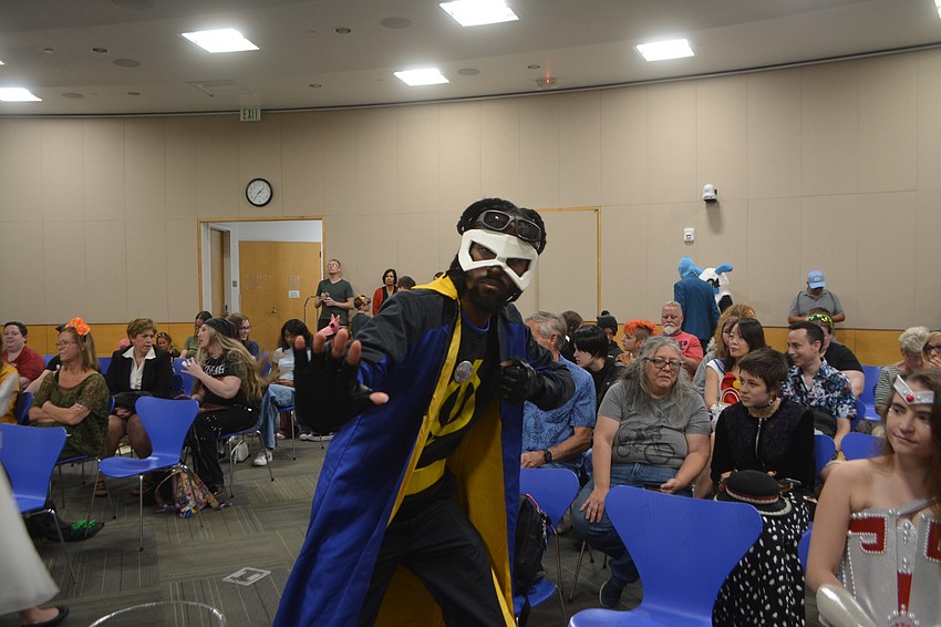 Cosplayer, Dimitri Grande, is showing off his Static Shock cosplay that took 1 month to build.