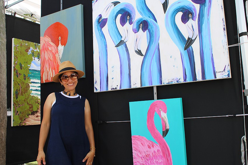 Artist Cesia Acevedo Martinez, showing her work at the St. Armands Circle Craft Festival, says not every flamingo needs to be pink.