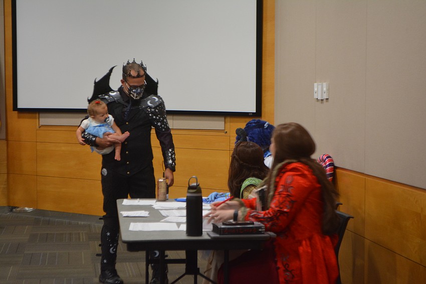 Michael Rowan dressed as Rhysand from novel 