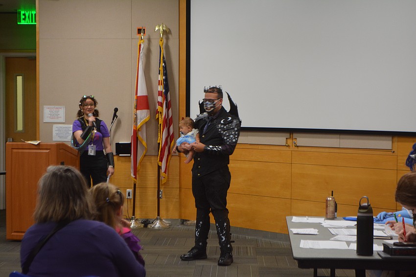 Michael Rowan and daughter Abigail Rowan dressed as Rhysand inspired by 