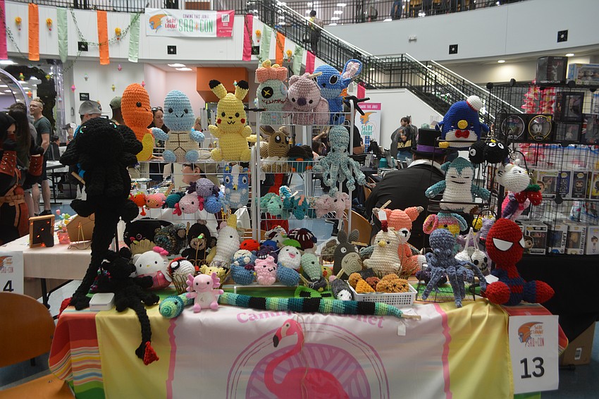 Camille's Crochet booth is ready for the SRQCon 2025 at the Selby Library.