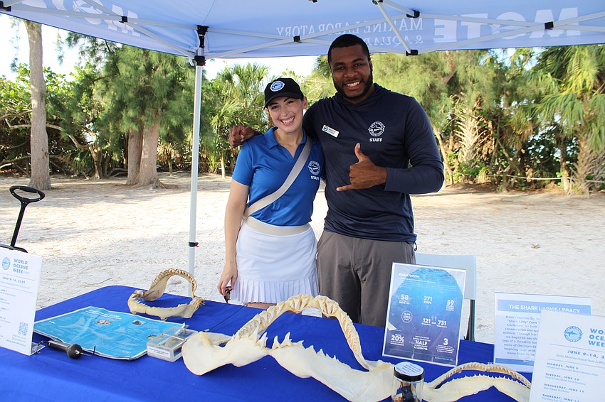 Sophia Johnson and John Emmanuel Perry offer educational demos at Mote Marine Laboratory & Aquarium for World Ocean Day.