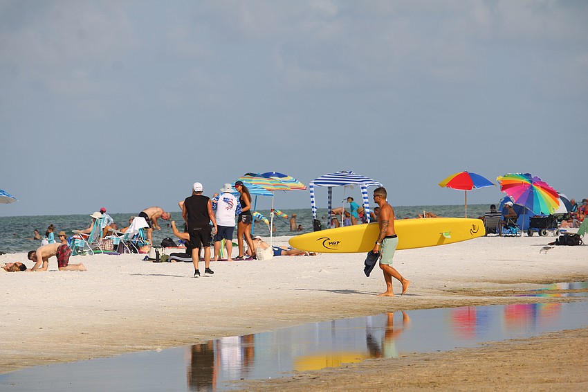 Plenty of beachgoers enjoyed Siesta Beach on World Ocean Day.