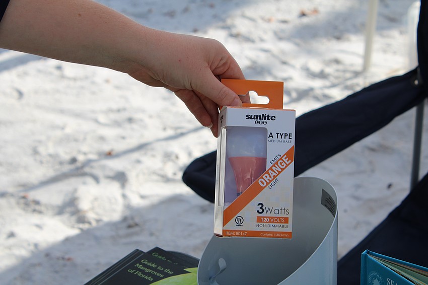 Sarasota County officials offer guidance on protecting local shores, demonstrating what lighting residents should use to reduce light pollution during turtle nesting season.