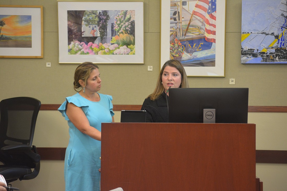 Longboat Key Chamber of Commerce President Kim Verreault (right) speaks at the June 9 town commission meeting alongside Diane Lopez, board chair.