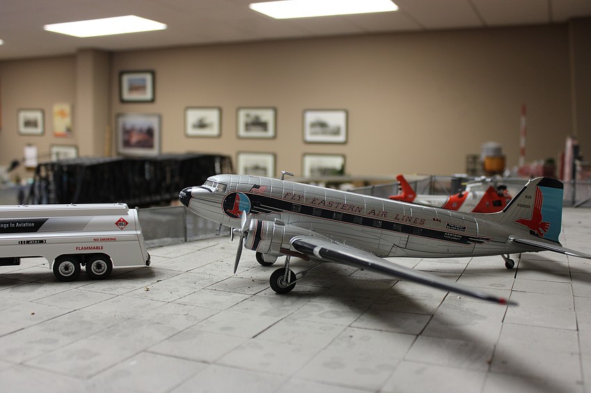 And when the model trains stop, the people can board the miniature airplane.