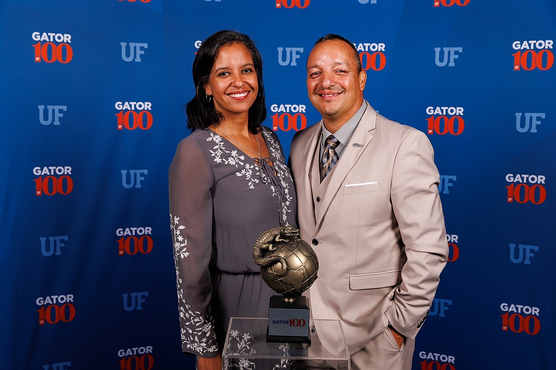 Erick Palacios (right) and his business, Plan to Prosper, were named to the Gator100 this spring. Courtesy photo