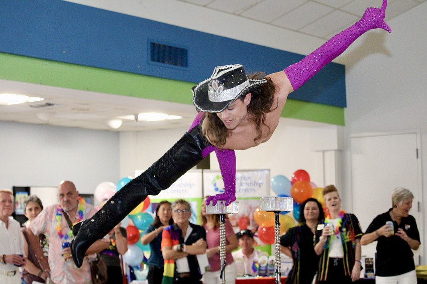 Michael Knapp, stage name Greta Gripp, performs an acrobatic routine at the Silver Pride celebration June 7 at Senior Friendship Centers.