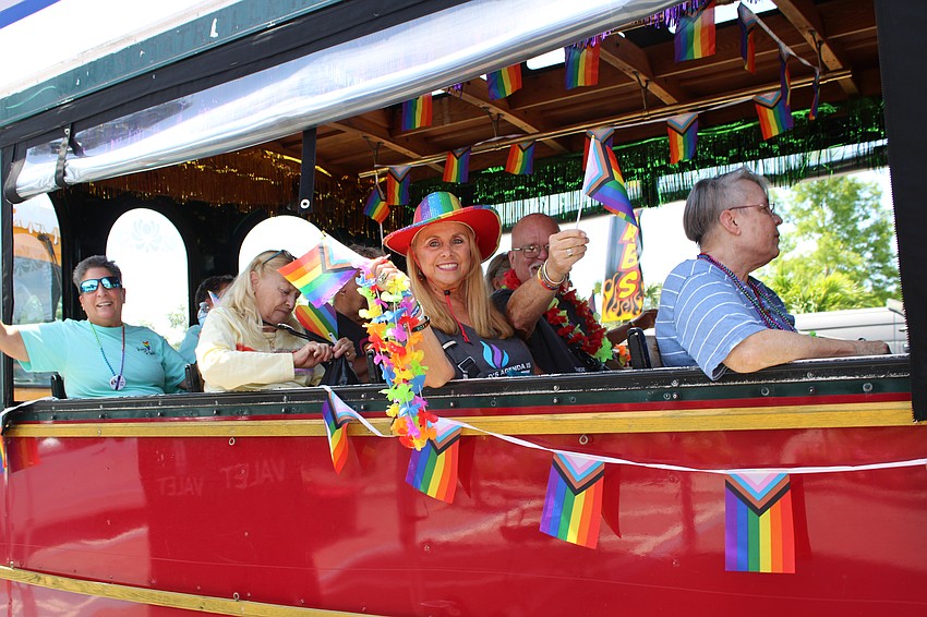 Attendees at this year's Silver Pride event filled two trolleys and waved to passersby in downtown Sarasota as they celebrated Pride Month.