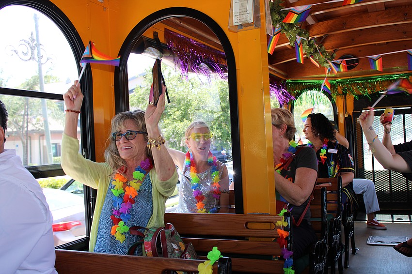 Two trolleys took celebrants from Silver Pride through downtown Sarasota.