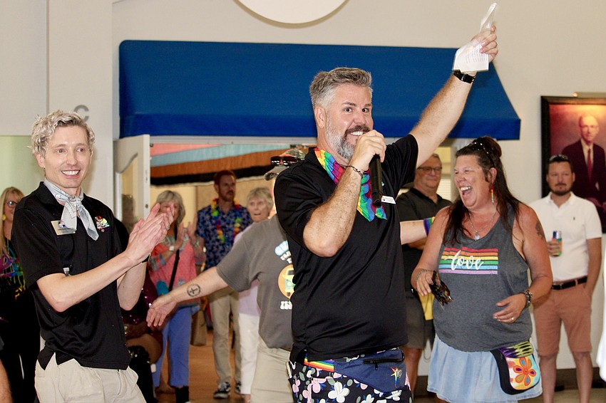 Pride Project SRQ President Jason Champion welcomes legacy couples to the dance floor at Senior Friendship Centers.