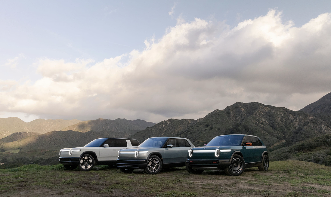 Products in Rivian’s line include, SUV R1S, Midsize SUV R2  and and crossover R3. It also has pickup truck R1T.