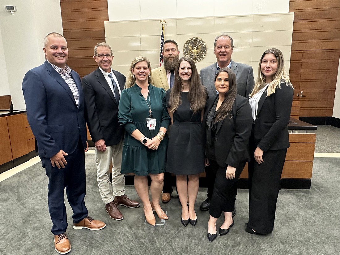 The Jacksonville Bankruptcy Bar Association installed officers and board members for 2025-26. From left, former Chairman Eugene Johnson, president of the Johnson Law Firm; board member Allan Wulbern, shareholder with Smith Hulsey & Busey; Secretary Lauren Box, attorney with the Johnson Law Firm; Vice President William McDaniel, partner with the Lansing Roy firm; President Angela Grewal, partner with the Adams & Reese firm; board member Douglas Neway, Chapter 13 Standing Trustee, standing behind immediate past president and Chairperson Angela Scott, also with the Office of the Chapter 13 Trustee; and Treasurer Carli Frederick, Judicial Term Law Clerk for the Hon. Jacob A. Brown. Not shown: Board members Samantha Kelley, partner at the Bruner Wright firm; Jerrett McConnell, president of McConnell Law Group; Ellsworth Summers, partner with Burr & Forman; and Richard Thames, president of the Thames Markey firm.