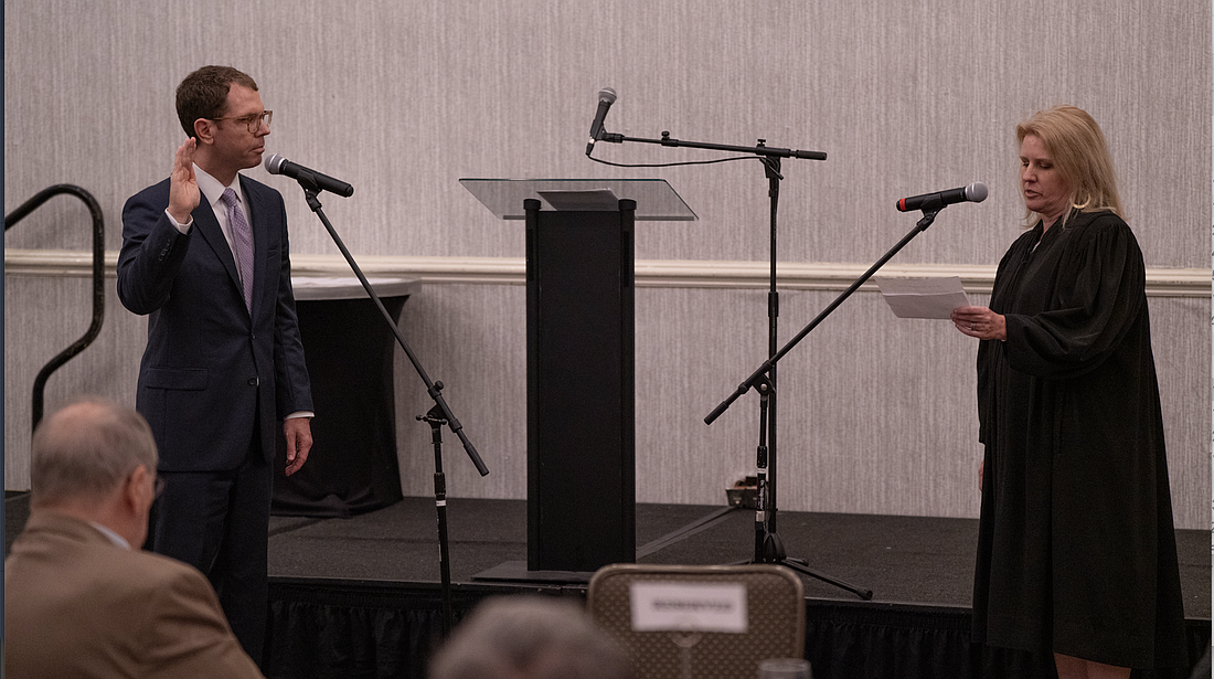 Brian Coughlin, a director at The Bedell Law Firm, was sworn in as the Jacksonville Bar Association’s 2025-26 president June 5 by Circuit Judge Ashley Wells Cox.