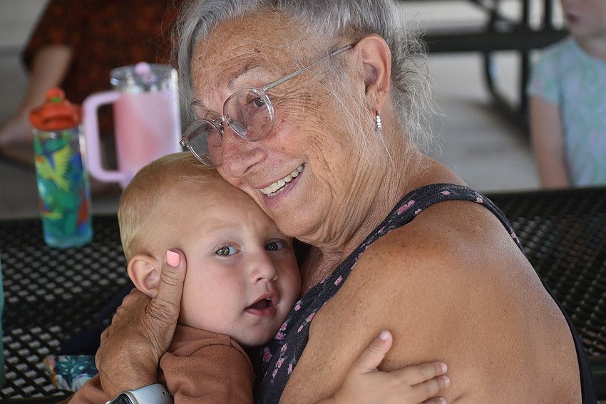Pat Napolitano hugs her 1-year-old grandson Patrick Litton. She just moved from Orlando to Lakewood Ranch to help out with her grandchildren and couldn't be happier.