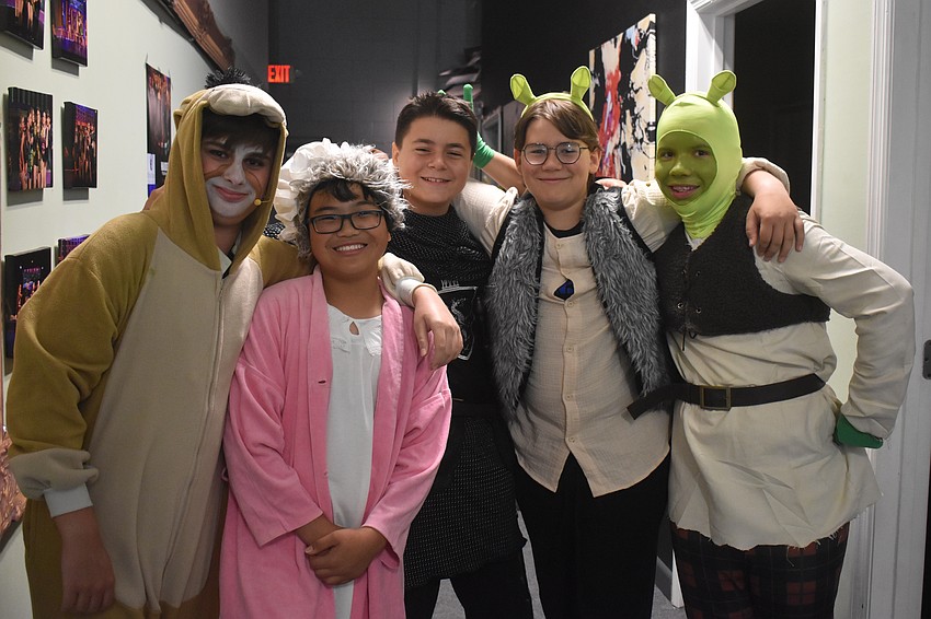 Noah Gross, Collin Borg, Ethan Davidson, Aeric Frantz and Rusty Frantz are dressed in costume before their performance of 