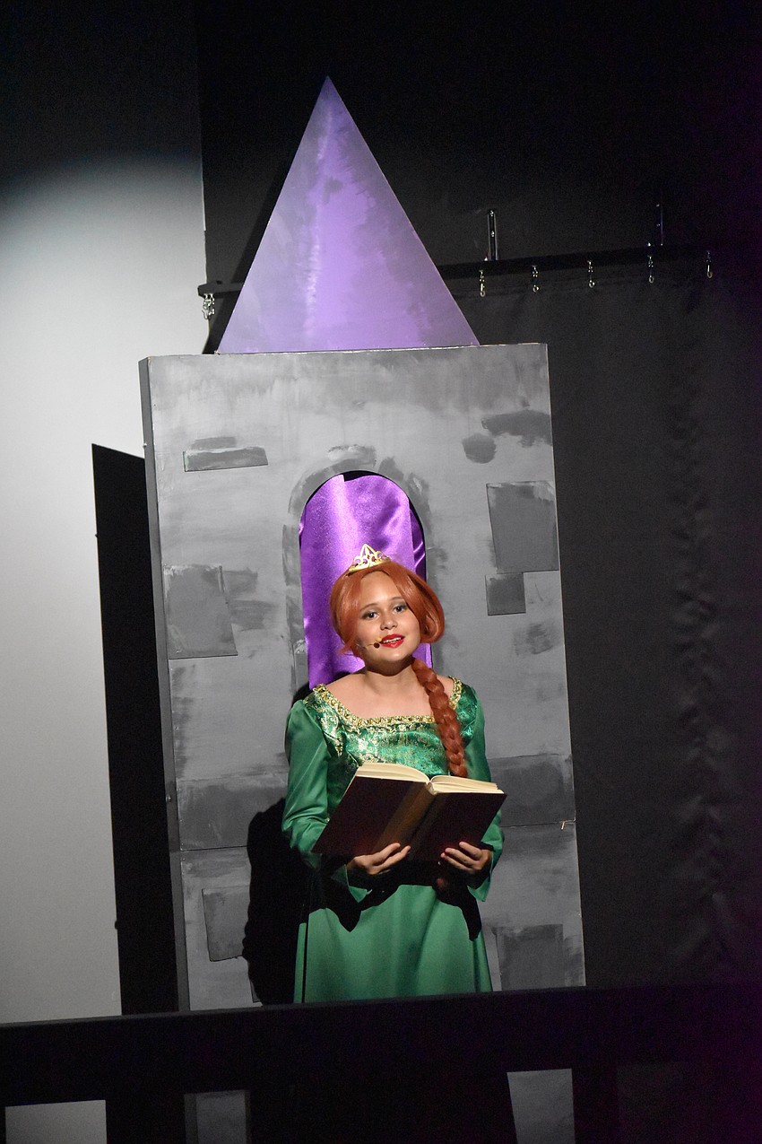 Amelia Shamieva plays teen Fiona during the song 