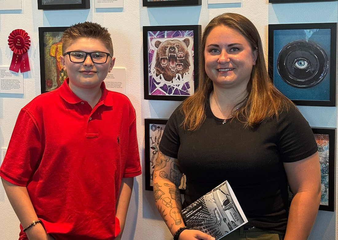 Seventh grader Bronx Hanratty and digital art teacher Katelyn Reyes went to the Dalí Museum Student Surrealist Art Exhibit where Hanratty received the Award of Excellence.