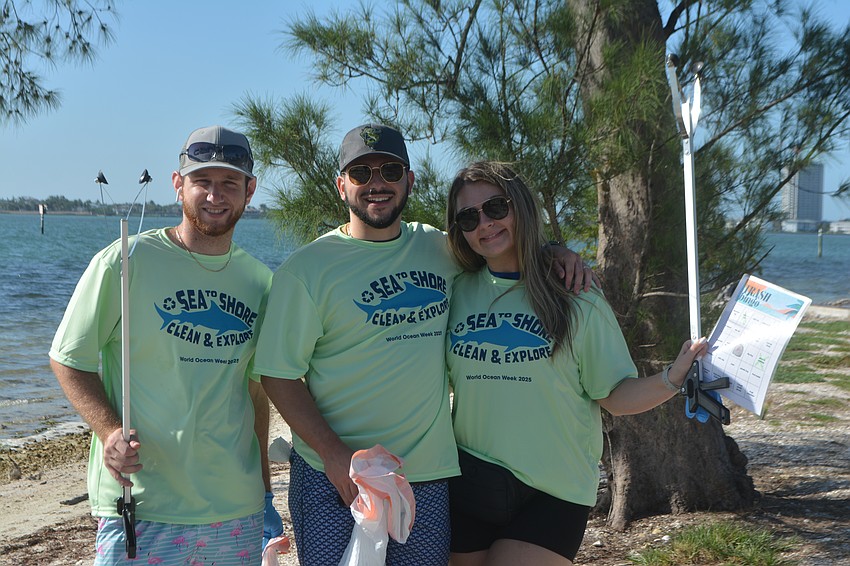 Quincy McGinney, Stephen Sattanino and Julia Sattanino volunteering as  land clean-up crew to celebrate World Ocean Week 2025.