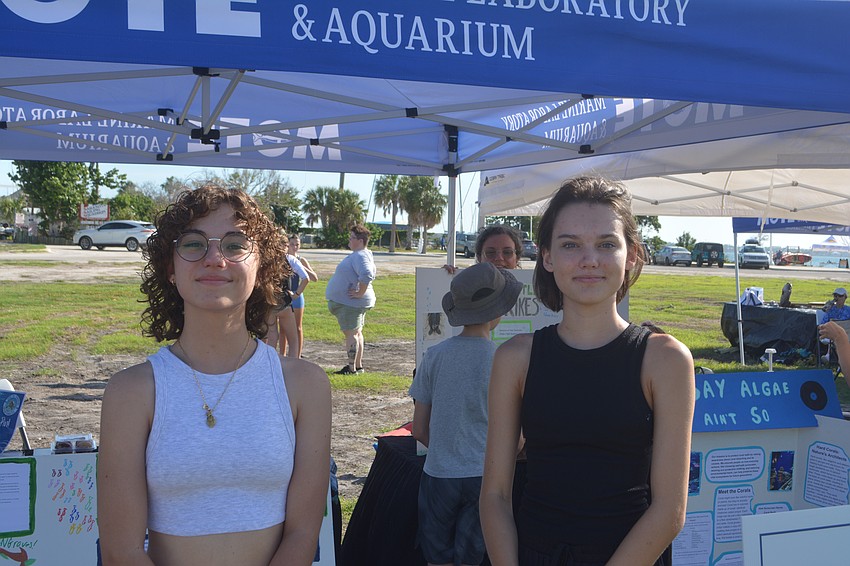 Homeschool students Isabelle Gunderson and Mackenzie Hall present their 