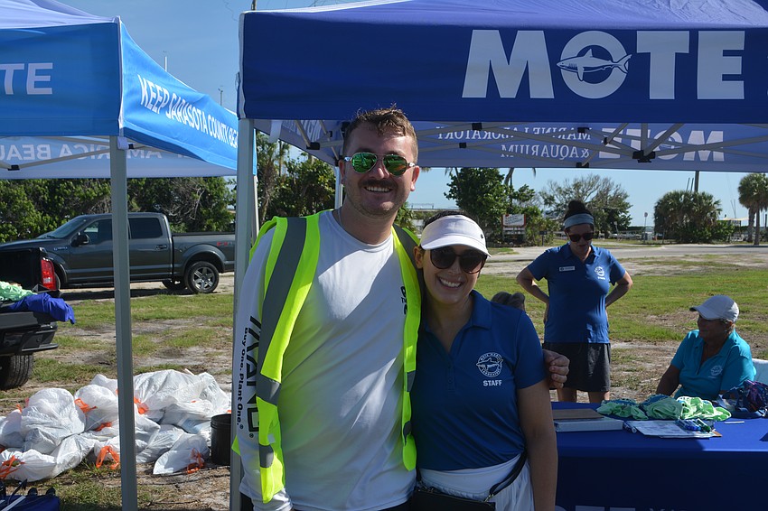 Hunter Jensen, program coordinator for Keep Sarasota County Beautiful, and Sophia Johnson, events manager for Mote Marine Lab and Aquarium pose to celebrate World Ocean Week.
