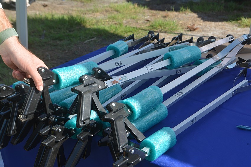 Grabber tool used to pick up the debris and trash.