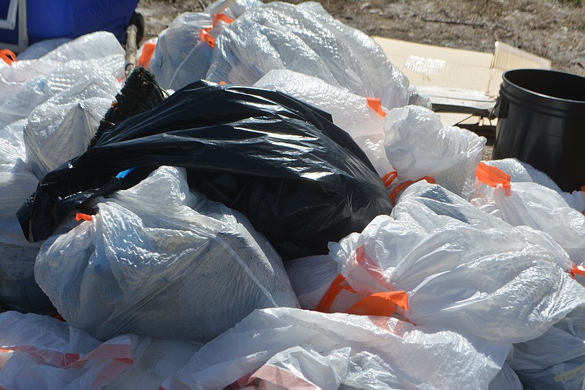 The debris and trash that was collected by the efforts of numerous of volunteers.