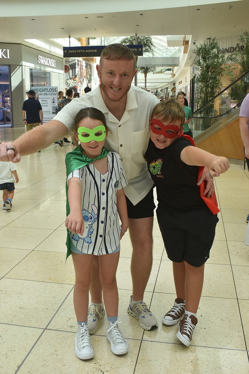 Bradenton's Tony Dyke spent the day with his children, 7-year-old Phoebe and 9-year-old Oakley. If they were superheroes, Tony and Phoebe would want to freeze time while Oakley says he would want super strength.