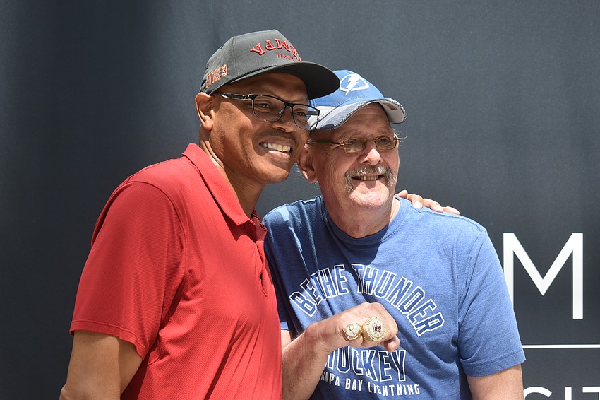 Shelton Quarles Jr. and Bob Hunek have met four times at the Dad's Day Block Party for the last four years.