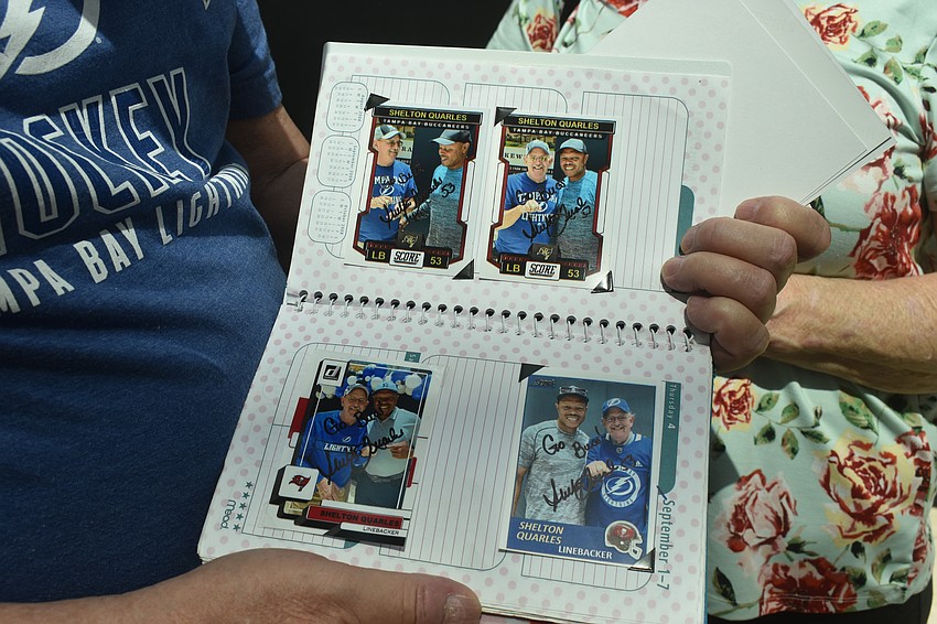 Bob Hunek has met Shelton Quarles Jr. four times before and Hunek created cards for Quarles to sign of photos of them together.