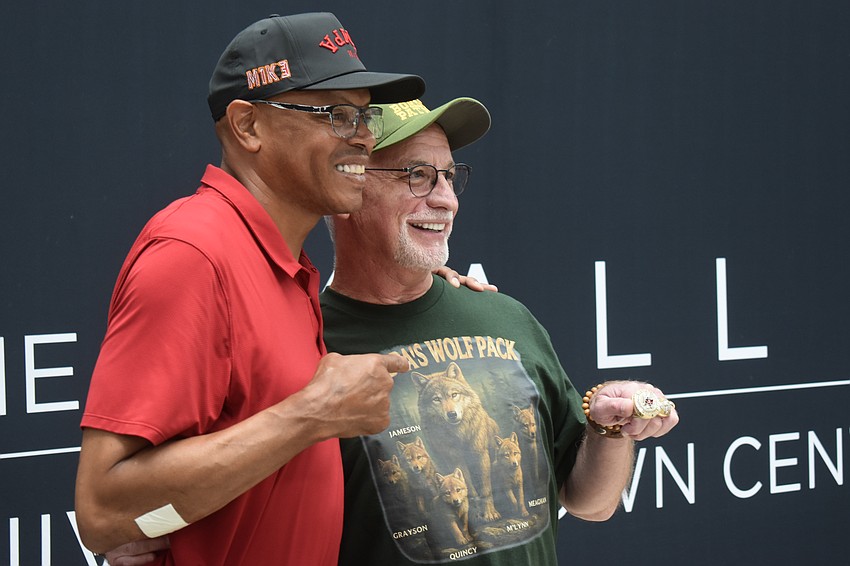 Former Buc Shelton Quarles poses with Lakewood Ranch resident Don Slate, who says he has been a Tampa Bay fan his whole life.