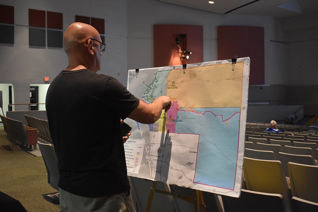 The School District of Manatee County holds meetings for the public to flip through physical maps of the proposed 2026-2027 Residential Attendance Zones.