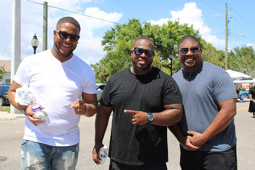 Attendees Marc Dortch, Tony Milton and Justin Dortch said they enjoyed the fellowship among community members putting on this weekend's Juneteenth block party.