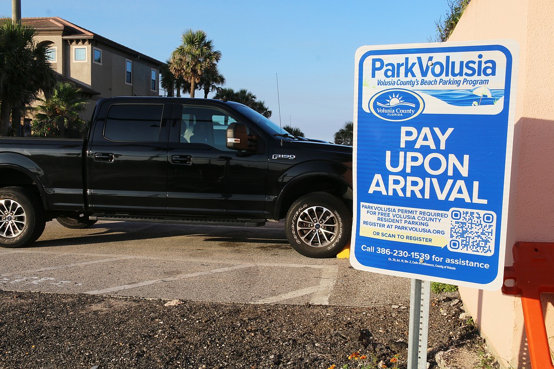 ParkVolusia was launched on Jan. 1 and charges visitors $20 a day to park in off-beach lots. Photo by Jarleene Almenas