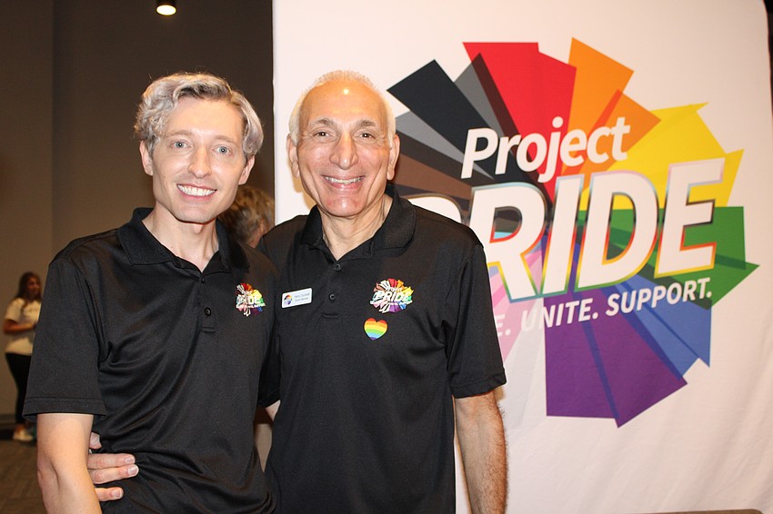 Project Pride SRQ President Justyn Hunter-Ceruti and Vice President Harry Cicchetti update community members on the group's upcoming events at Diverse Fest.