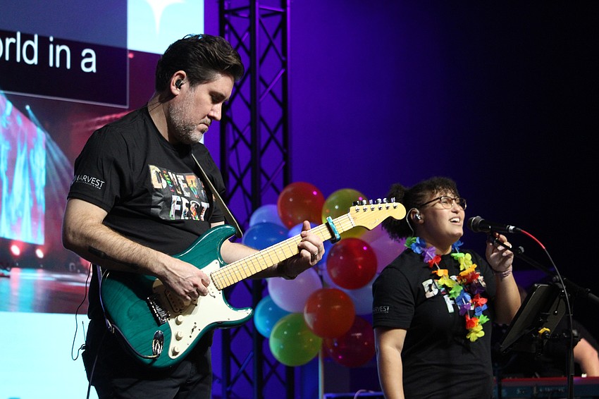Rev. Dan Minor at The Harvest Sarasota shreds the guitar at Diverse Fest, as the church band played songs like 